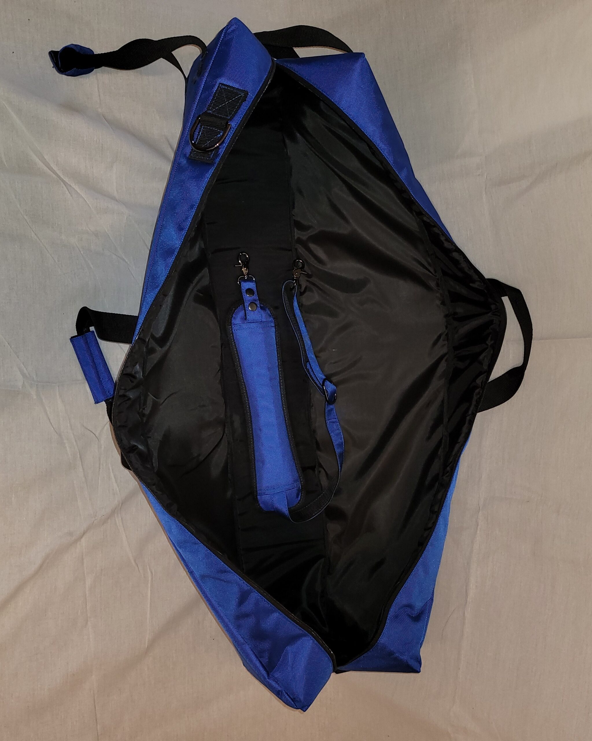Blue padded carrying case with shoulder strap